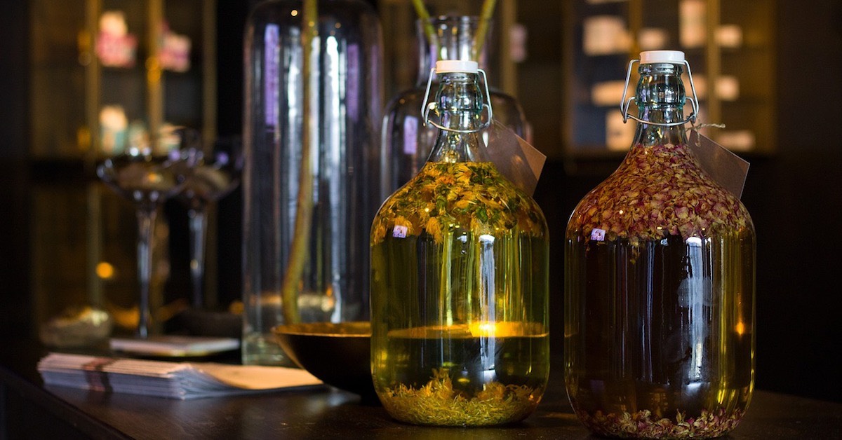 Bottles of oils with herbs; Consultations with Nikki Haak